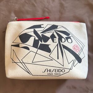 Shiseido Tokyo Beige Pouch Bag with Black Abstract Shapes Design